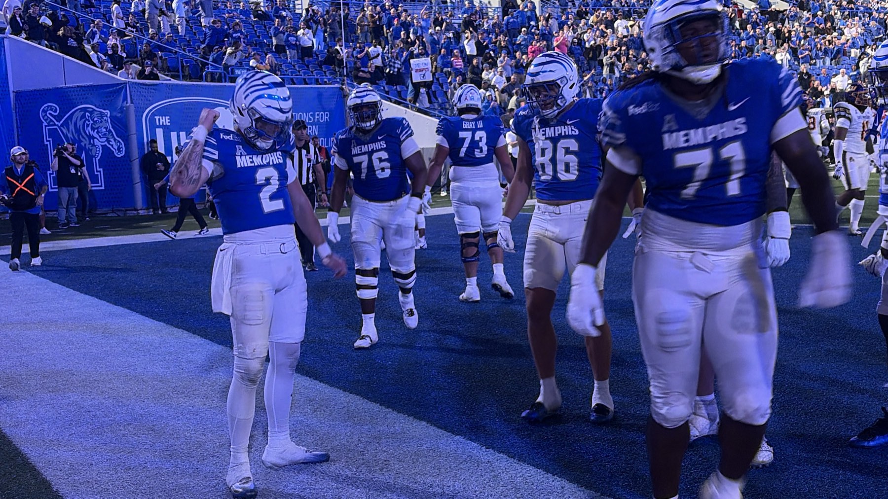 Memphis and East Carolina players during fourth-quarter action
